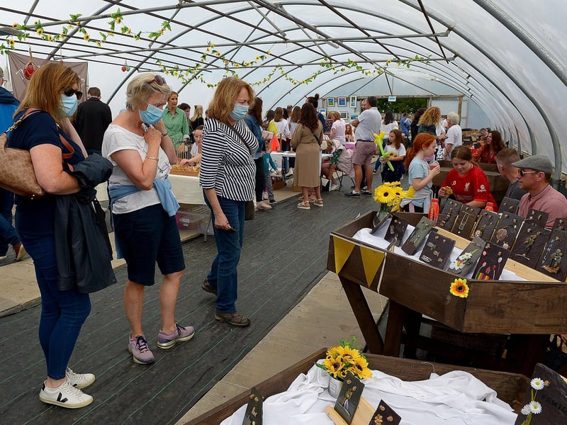 People browse the stalls at the Family HOPE Day held at the Mullan HOPE Centre in Moville, on Sunday afternoon last. DER2134GS – 010
