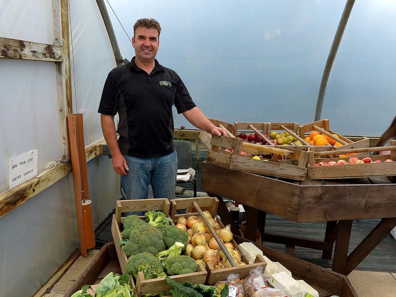 Donald Logue from the Bee Organic Farm in Muff displays fresh produce at the Family HOPE Day held at the Mullan HOPE Centre in Moville, on Sunday afternoon last. Photos: George Sweeney. DER2134GS – 007