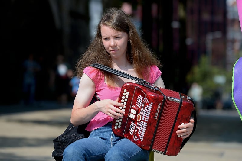 Irish traditional musician playing in Guildhall Square yesterday afternoon. Photo: George Sweeney. DER2134GS  023