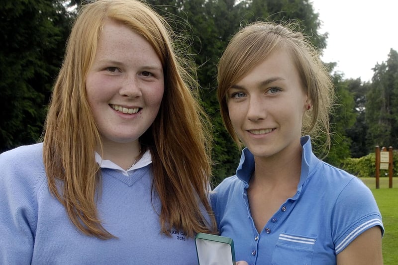 Winner of the girls section in the Portadown Golf Club Juvenile Captains Day Competition in 2010, Emma Willis, right, receives her prize from Junior Ladies Captain, Judith Connolly. PT35-249.