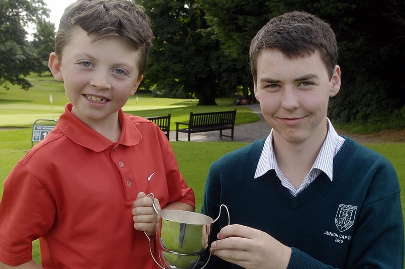 The Juvenile Captain’s Day winner in 2010, Cameron Fox receives his prize from Juvenile Captain Andrew Corkin.