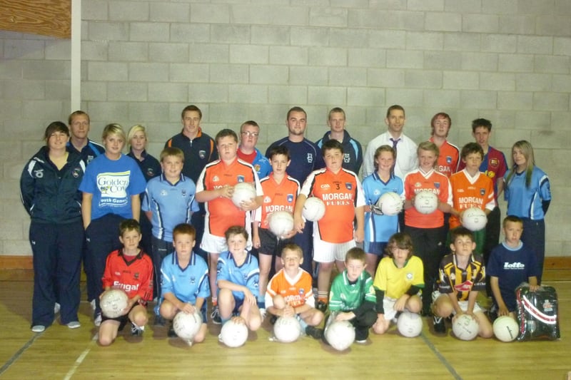 Included with children in the underage group at the Ballyhegan Gaelic Football Club youth scheme in 2010 are Tony Keegan (organiser), Johnny McKeever (organiser), James P McKeever (leader), Shane Morgan (leader), Sarah Malone (leader), Cathal Cullen (leader), James McKeever (leader), Emma Guy (Armagh ladies), Laura Forker (Armagh ladies), Charlie Vernon (Armagh seniors) and Paul McGrane (ex-Armagh seniors).PT35-182PVD
