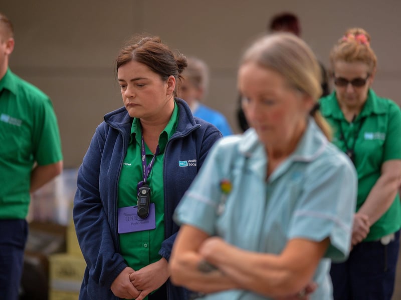 Care staff from Altnagelvin hospital, pictured on Thursday evening last, during an Act of Remembrance for all who have lost their battle with COVID-19. DER2020GS – 037