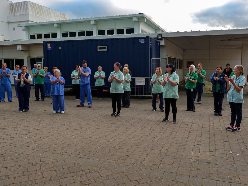 Altnagelvin hospital care staff show their appreciation for and clap for the support given to NHS frontline staff by the public, on Thursday evening last. DER2020GS – 040