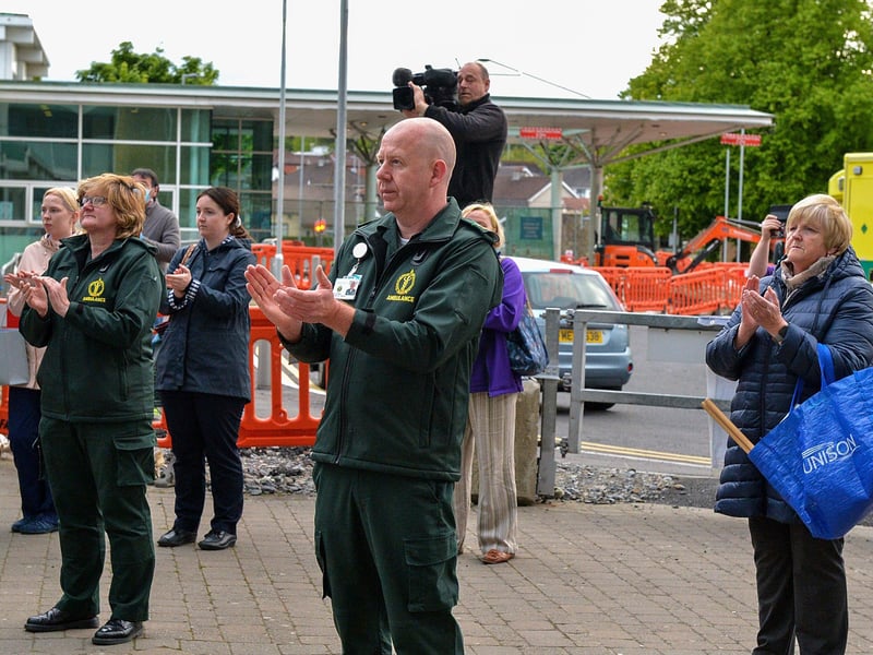 Altnagelvin hospital ambulance and care staff show their appreciation for and clap for the support given to NHS frontline staff by the public, on Thursday evening last. DER2020GS – 042