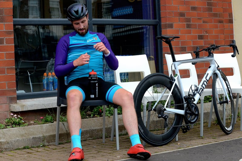 Epic triathlon hero Danny Quigley pictured at Destine’s premises, Foyle Road, on Sunday afternoon after completing his tenth and final daily 112 mile cycle before setting off on his final 26.2 miles run to complete 10 triathlons in 10 days for charity. Photo: George Sweeney / Derry Journal.  DER2135GS – 006