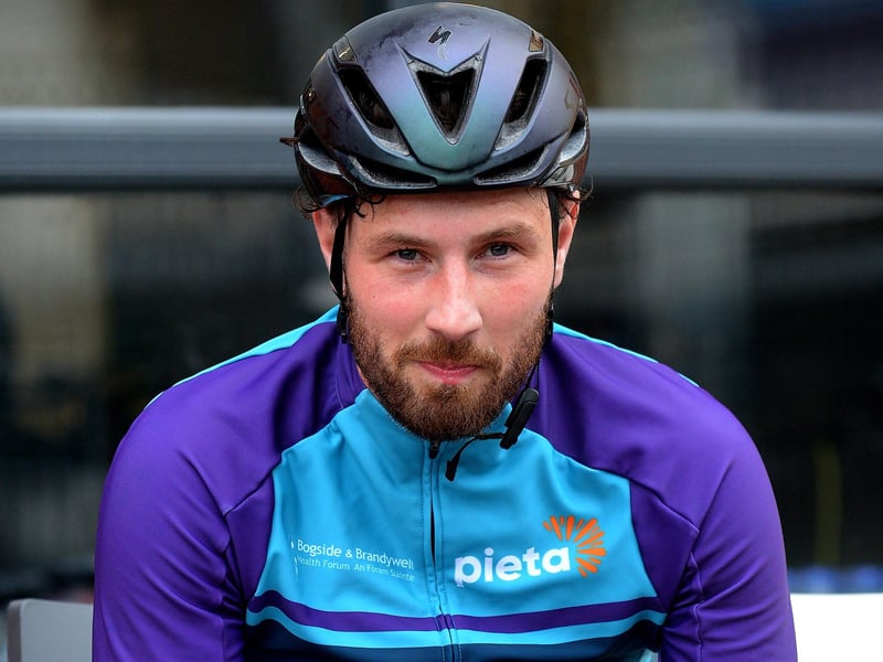 Epic triathlon hero Danny Quigley pictured at Destine’s premises, Foyle Road, on Sunday afternoon after completing his tenth and final daily 112 mile cycle before setting off on his final 26.2 miles run to complete 10 triathlons in 10 days for charity. Photo: George Sweeney / Derry Journal. DER2135GS – 007