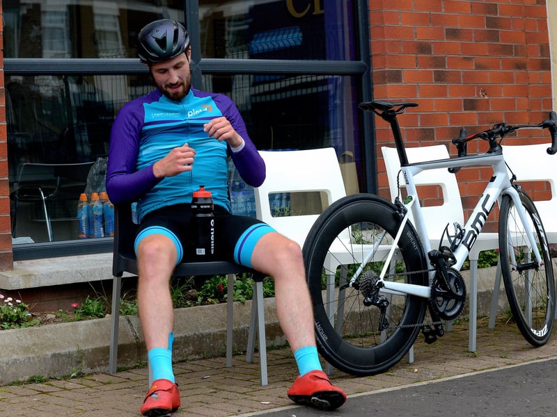 Epic triathlon hero Danny Quigley pictured at Destine’s premises, Foyle Road, on Sunday afternoon after completing his tenth and final daily 112 mile cycle before setting off on his final 26.2 miles run to complete 10 triathlons in 10 days for charity. Photo: George Sweeney / Derry Journal. DER2135GS – 006