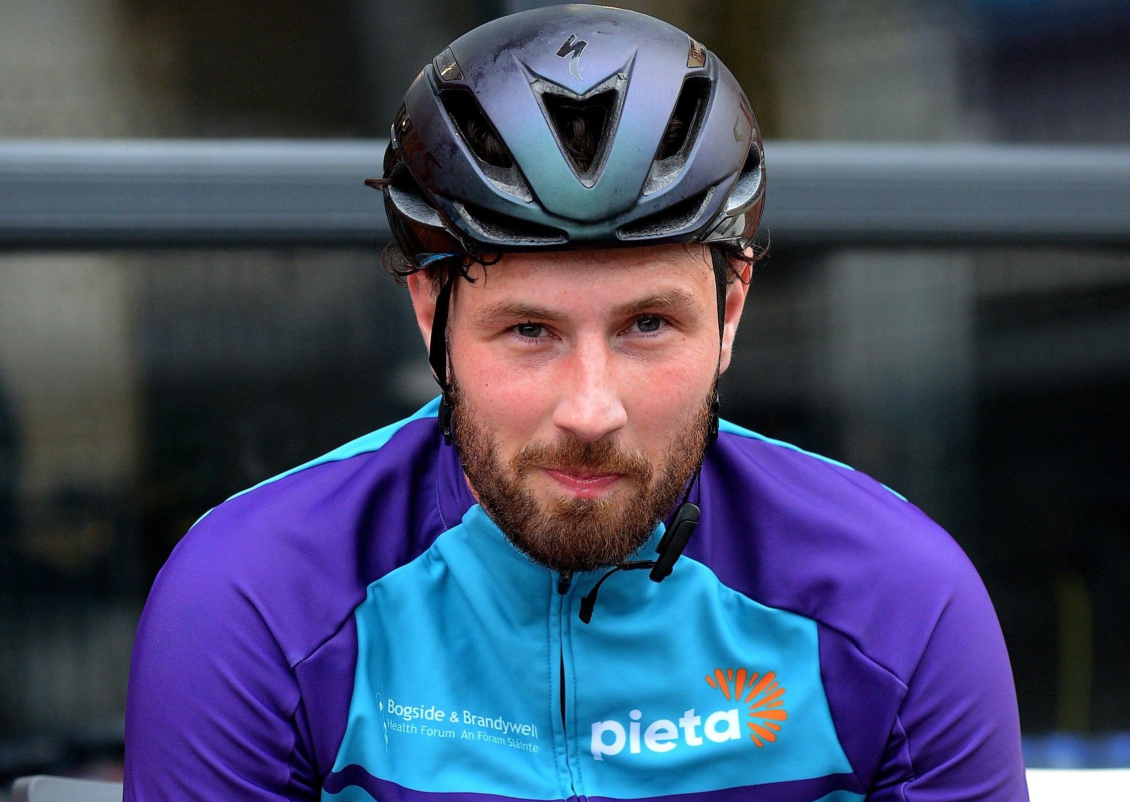 Epic triathlon hero Danny Quigley pictured at Destineâ€TMs premises, Foyle Road, on Sunday afternoon after completing his tenth and final daily 112 mile cycle before setting off on his final 26.2 miles run to complete 10 triathlons in 10 days for charity. Photo: George Sweeney / Derry Journal.  DER2135GS â€“ 007