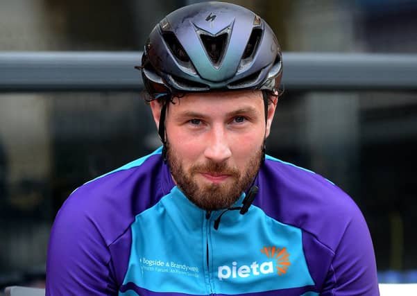 Epic triathlon hero Danny Quigley pictured at Destineâ€TMs premises, Foyle Road, on Sunday afternoon after completing his tenth and final daily 112 mile cycle before setting off on his final 26.2 miles run to complete 10 triathlons in 10 days for charity. Photo: George Sweeney / Derry Journal. DER2135GS – 007