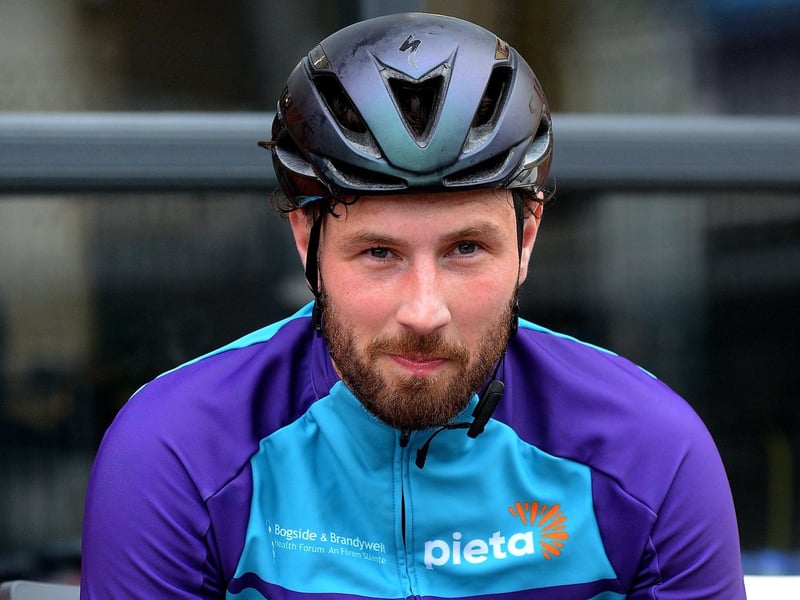 Epic triathlon hero Danny Quigley pictured at Destine’s premises, Foyle Road, on Sunday afternoon after completing his tenth and final daily 112 mile cycle before setting off on his final 26.2 miles run to complete 10 triathlons in 10 days for charity. Photo: George Sweeney / Derry Journal. DER2135GS – 007