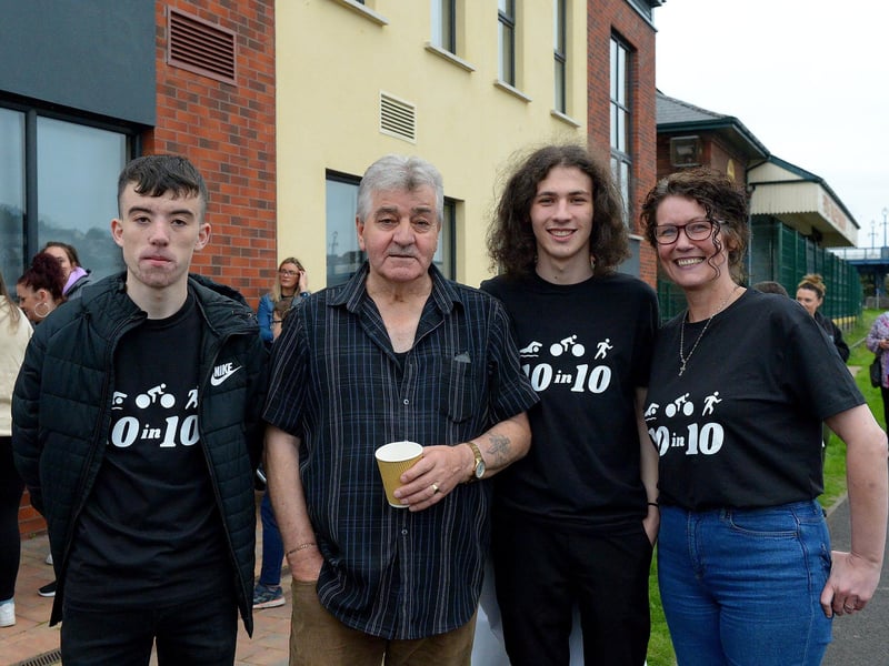 Pictured are sporting hero Danny Quigley’s nephew Shea Coyle, grandad Willie Coyle, brother Colum and mum Denise.  Photo: George Sweeney / Derry Journal.  DER2135GS – 031