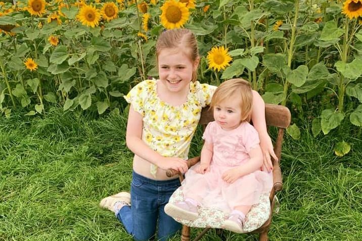 Roberta Warnock sent us this lovely photo of her granddaughters, Olivia and Amelia at Moira Sunflowers