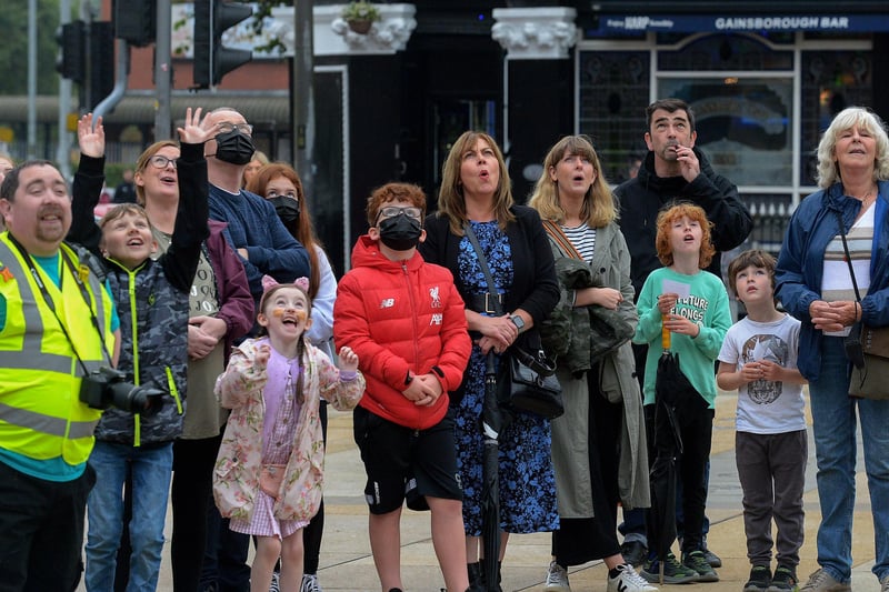 People enjoy the entertainment in Guildhall Square during the Carnival of Colours festival last weekend. Photo: George Sweeney / Derry Journal.  DER2136GS – 009