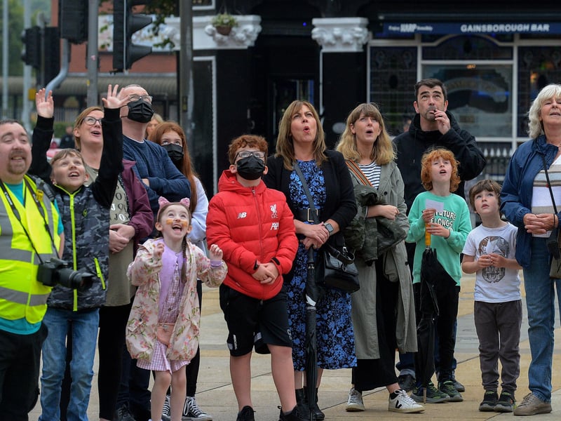 People enjoy the entertainment in Guildhall Square during the Carnival of Colours festival last weekend. Photo: George Sweeney / Derry Journal. DER2136GS – 009