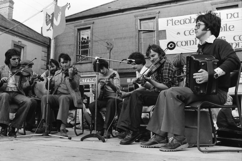 Musicians playing a few tunes on Market Square during the Fleadh in 1979.