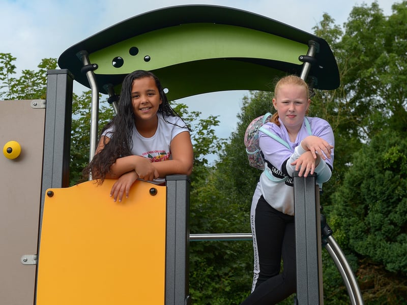 Lailah and Emily enjoy the fun at the newly opened Killea Community Park on Saturday afternoon last. Photo: George Sweeney. DER2136GS – 130