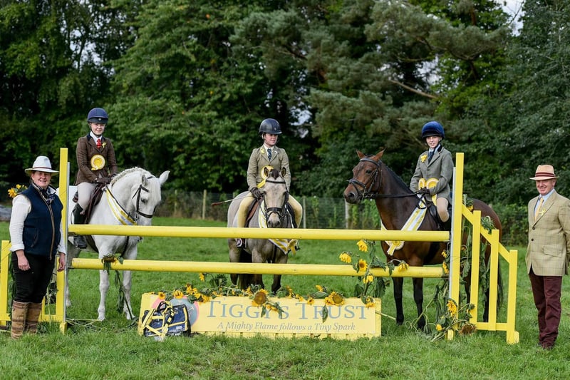 Winners of the working hunter championship, from left, Katelyn Irvine riding Corha Delight, first reserve, Kitty Cullen riding Moyans Dun Deal, reserve champion, Kara Cosgrove riding Beechill Suzi, champion. Picture: Tori O'Connor
