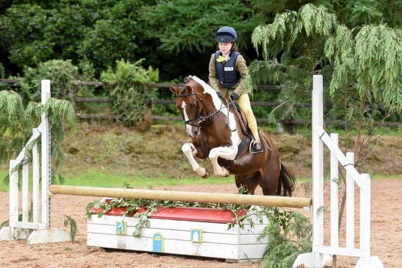 Lily Murphy riding Milford Spectactular, winners of the 65cm performance working hunter