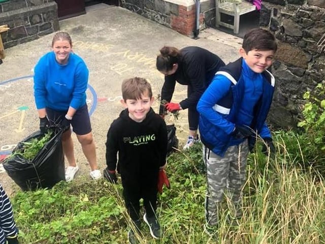 Laura McAllister and some young helpers