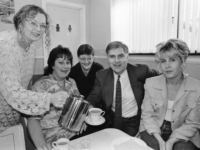 Paula McKay pours a cuppa for Robin Mullan, NI director, National Lotteries Charities Board, after he officially opened the Ballymagraorty Mothers and Toddlers’ Centre. Included, from left, are Lorna Murray, Shirley Deane, chairperson, and, on right, Oonagh Cusack.