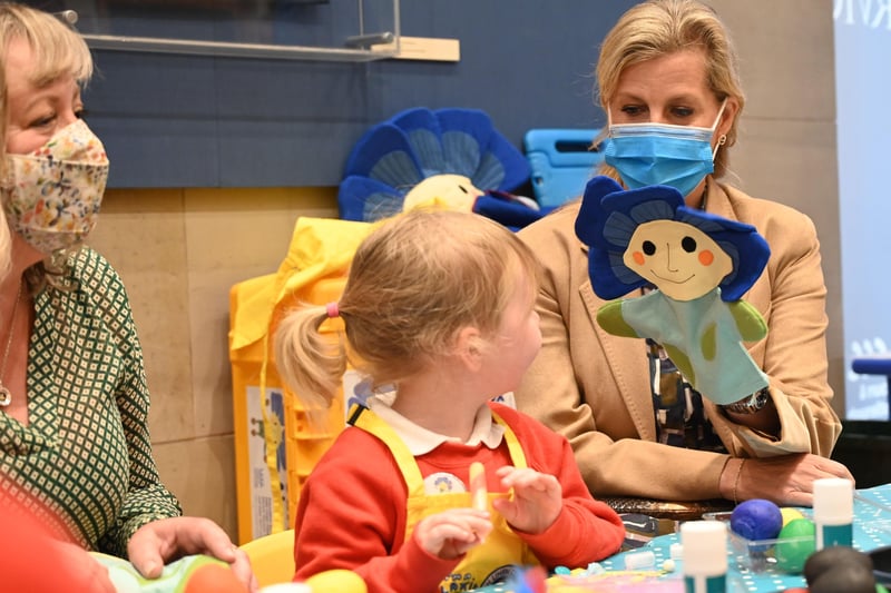 The Countess of Wessex chats to the pupils of Barbour Nursery School and tries out the Flaxie puppet.