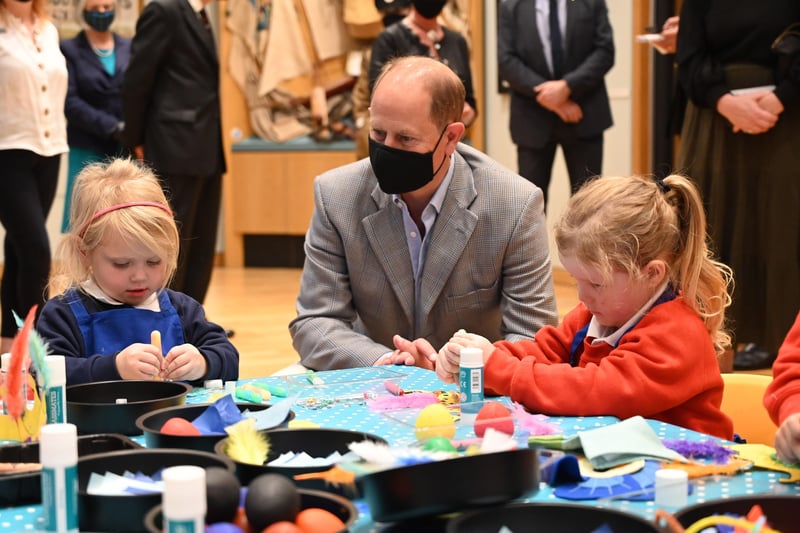 The Earl of Wessex talks to some of the pupils from Barbour Nursery School as they take part in a craft 'Flaxie' workshop.