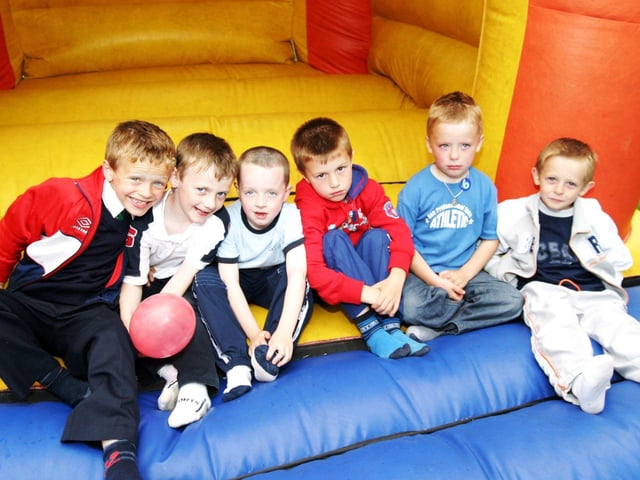 Birthday boy Caoimhin McCallion enjoys the bouncy castle with friends.