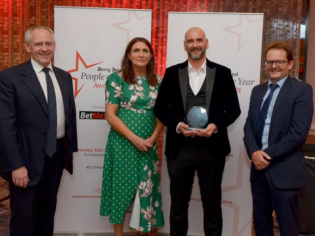 Community Development Person of the Year winner Gary Rutherford pictured with Paul McLean (on the left)from Principal Sponsor BetMcLean, Teresa McCloskey, Performance and Quality Manager of category sponsor Apex Housing Association, and Graeme Huston, Regional Director, JPIMedia. Photo: George Sweeney. DER2139GS – 060