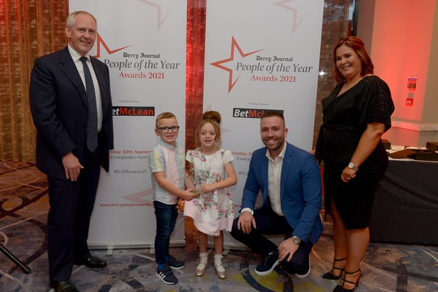 Outstanding Bravery Award winner Adam and Aoife Burke pictured with Paul McLean (on the left), from Principal Sponsor BetMcLean, Blane Tierney and Diane Burke, Commercial Director of Derry Journal, JPIMedia.  Photo: George Sweeney.  DER2139GS – 057