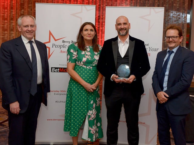 Community Development Person of the Year winner Gary Rutherford pictured with Paul McLean (on the left)from Principal Sponsor BetMcLean, Teresa McCloskey, Performance and Quality Manager of category sponsor Apex Housing Association, and Graeme Huston, Regional Director, JPIMedia. Photo: George Sweeney. DER2139GS – 060