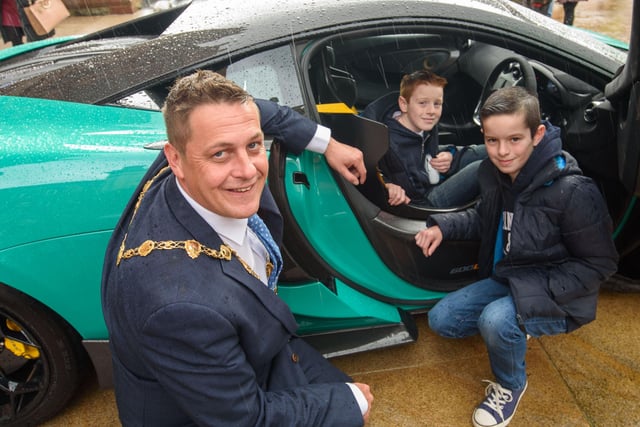 The Mayor, Aderman Graham Warke with Evan and Keenan Gallagher during Super Car Sunday in aid of the Mayorâ€TMs Charity Appeal for Foyle Down Syndrome Trust. Picture Martin McKeown. 03.10.21