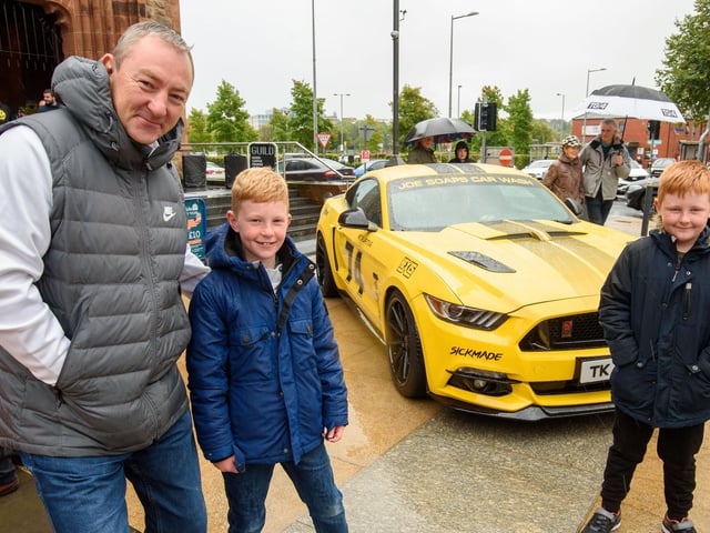 Keith Baldrick and his sons Will and Alfie with a Ford Mustang during Super Car Sunday in aid of the Mayorâ€TMs Charity Appeal for Foyle Down Syndrome Trust. Picture Martin McKeown. 03.10.21