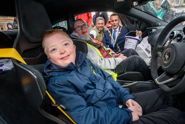Kyle McFaul and Declan Feeney with Gary McCaul and the Mayor Graham Warke during Super Car Sunday in aid of the Mayorâ€TMs Charity Appeal for Foyle Down Syndrome Trust. Picture Martin McKeown. 03.10.21