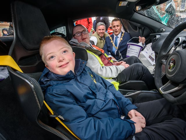 Kyle McFaul and Declan Feeney with Gary McCaul and the Mayor Graham Warke during Super Car Sunday in aid of the Mayorâ€TMs Charity Appeal for Foyle Down Syndrome Trust. Picture Martin McKeown. 03.10.21