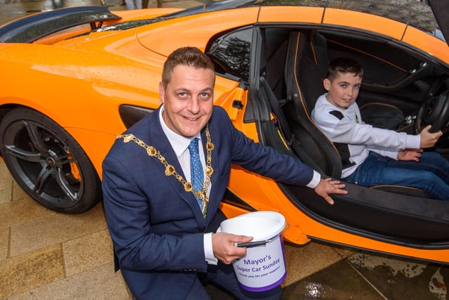 The Mayor Alderman Graham Warke with Aaron Lynch during Super Car Sunday in aid of the Mayorâ€TMs Charity Appeal for Foyle Down Syndrome Trust. Picture Martin McKeown. 03.10.21
