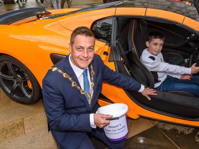 The Mayor Alderman Graham Warke with Aaron Lynch during Super Car Sunday in aid of the Mayorâ€TMs Charity Appeal for Foyle Down Syndrome Trust. Picture Martin McKeown. 03.10.21