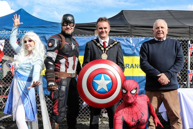 The Mayor Cllr Stephen Martin and  Chairman of the Lisburn Branch of the Royal British Legion Brian Sloan with NI SuperHeros. Pic by Norman Briggs, rnbphotographyni