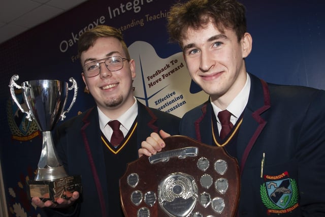 Winners Ryan and Steven celebrating their awards for Contribution to Community and Enthusiasm For Writing respectively at the Foyle College Annual Senior Prizegiving.