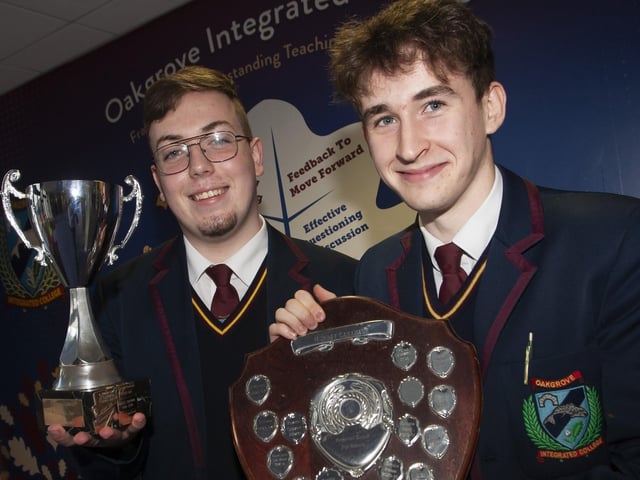Winners Ryan and Steven celebrating their awards for Contribution to Community and Enthusiasm For Writing respectively at the Foyle College Annual Senior Prizegiving.