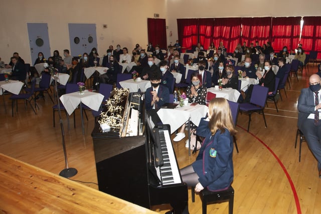 A section of the audience at Oakgroveâ€TMs Annual Senor Prizegiving, with pianist Ellie McMichael who performed at the opening of the ceremony.