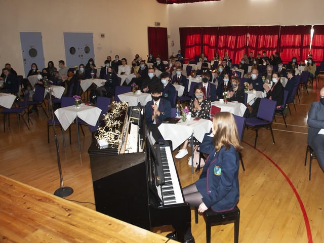 A section of the audience at Oakgroveâ€TMs Annual Senor Prizegiving, with pianist Ellie McMichael who performed at the opening of the ceremony.