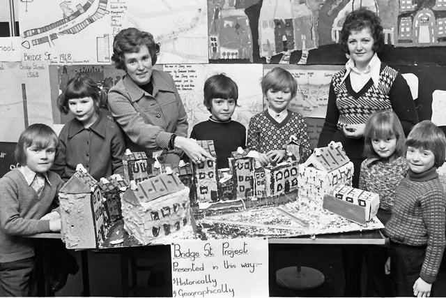 1975... Marie Doherty (left) and Anne McMaster with kids from Holy Child PS who carried out research into the history of Bridge Street. The children are, from left, Liam McIntyre, Linda Sheerin, Graham Browne, Adrian Duffy, Mairead Doherty and Cathal Doherty.