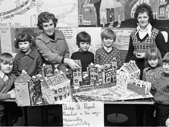 1975... Marie Doherty (left) and Anne McMaster with kids from Holy Child PS who carried out research into the history of Bridge Street. The children are, from left, Liam McIntyre, Linda Sheerin, Graham Browne, Adrian Duffy, Mairead Doherty and Cathal Doherty.