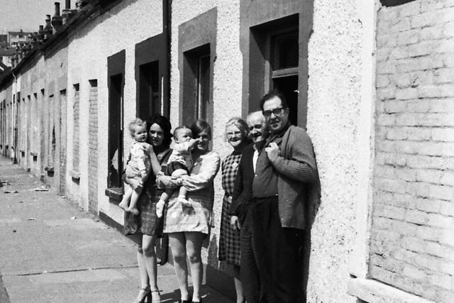 1973... Mr ans Mrs George Murphy outside their home of 40 years at Stanley's Walk.