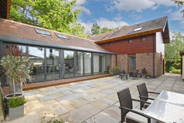 This is the outdoor area just beyond the kitchen's bi-folding doors.