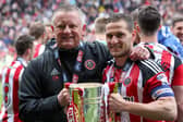 Chris Wilder and Billy Sharp celebrate winning the League One title: Jamie Tyerman/Sportimage