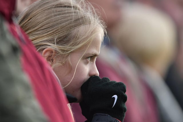 A young fan watches on intently at Mariners Park.