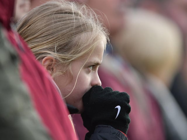 A young fan watches on intently at Mariners Park.