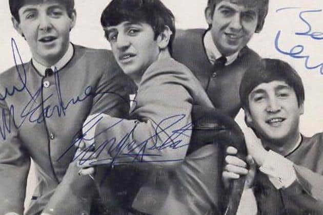 Pictured is a signed memorabilia picture of The Beatles courtesy of Tracks Ltd UK the Lancashire-based Beatles and music memorabilia specialists.